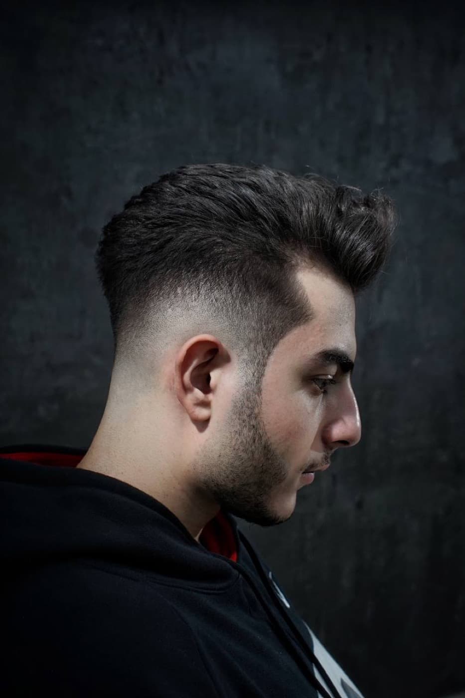 Clean low fade haircut finished at MK Barbers Level UP